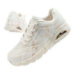 Buty Skechers Uno 155584/OFWT białe. Białe buty sportowe na co dzień damskie bez wzorów, ze skóry, trekkingowe. Za 545.71 zł.