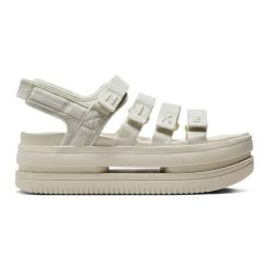 Sandały Nike Icon Classic Se FJ2595-002 beżowy. Brązowe sandały damskie bez wzorów, bez obcasa. Za 406.54 zł.