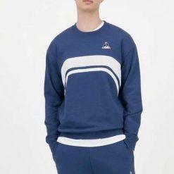 Bluza polarowa LE COQ SPORTIF 2520868L Niebieski. Niebieskie bluzy bez kaptura męskie Le Coq Sportif, l, z polaru. Za 204.99 zł.