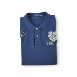 Koszulka damska Polo Ralph Lauren z krótkim rękawem. Niebieskie topy sportowe damskie Ralph Lauren, l, bez wzorów, bez ramiączek. Za 170.36 zł.