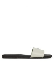 Calvin Klein Jeans Klapki Flat Sandal Slide Mg YW0YW01697 Biały. Białe klapki damskie Calvin Klein Jeans, bez wzorów, z jeansu, bez obcasa. Za 209.99 zł.
