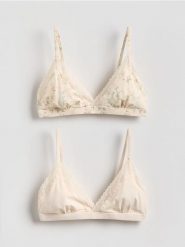 Miekki biustonosz 2 pack - złamana biel. Biustonosze Reserved, bez wzorów, z dzianiny. Za 89.99 zł.