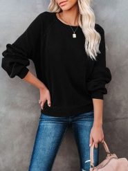 Milan Kiss Bluzka w kolorze czarnym rozmiar: M. Czarne bluzki damskie Milan Kiss, m, bez wzorów, bez kołnierzyka, bez ramiączek. Za 152.99 zł.