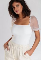Biała Bluzka Avani. Białe bluzki damskie Renee, l, bez wzorów, z dzianiny, bez kołnierzyka, bez ramiączek. Za 34.99 zł.