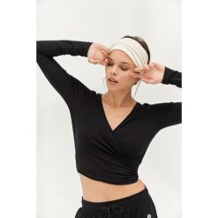 Top do jogi Moonholi Total Eclipse z długim rękawem. Czarne topy damskie MOONHOLI, s, bez wzorów, bez kołnierzyka. Za 329.00 zł.