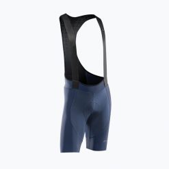 Spodenki rowerowe męskie Northwave Fast Bibshort. Niebieskie szorty męskie Northwave, bez wzorów, z materiału. Za 409.99 zł.