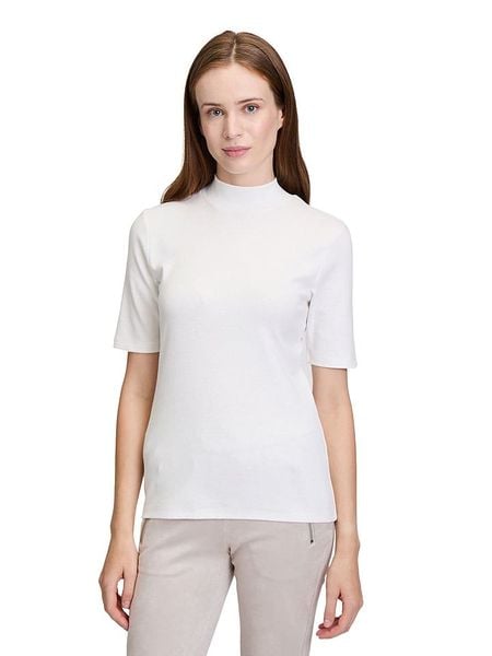 CARTOON Koszulka w kolorze białym rozmiar: 38. Białe bluzki damskie Cartoon, bez wzorów, bez kołnierzyka, bez ramiączek. Za 56.53 zł.