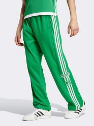 Adidas Spodnie dresowe w kolorze zielonym rozmiar: XL. Zielone spodnie dresowe męskie Adidas, bez wzorów, z dresówki. Za 162.49 zł.