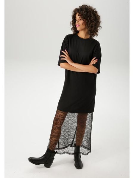 Aniston Sukienka w kolorze czarnym rozmiar: 42. Czarne sukienki damskie Aniston, bez wzorów, z bawełny, bez kołnierzyka, bez ramiączek, maxi. Za 69.58 zł.