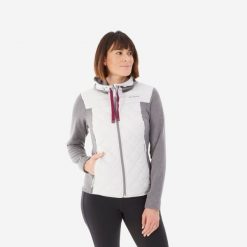Bluza turystyczna damska Quechua NH100 Hybrid. Szare bluzy z kapturem damskie QUECHUA, m, z dzianiny. W wyprzedaży za 79.99 zł.