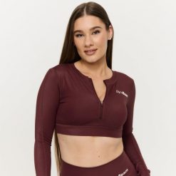 Top damski fitness z zamkiem Prime Fig. Fioletowe topy sportowe damskie GYMBEAM, m, bez wzorów, z elastanu, bez ramiączek. Za 109.90 zł.