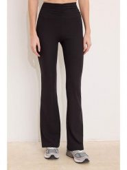 Trendyol Spodnie w kolorze czarnym rozmiar: L. Czarne spodnie materiałowe damskie Trendyol, bez wzorów, z materiału, z podwyższonym stanem. Za 73.99 zł.