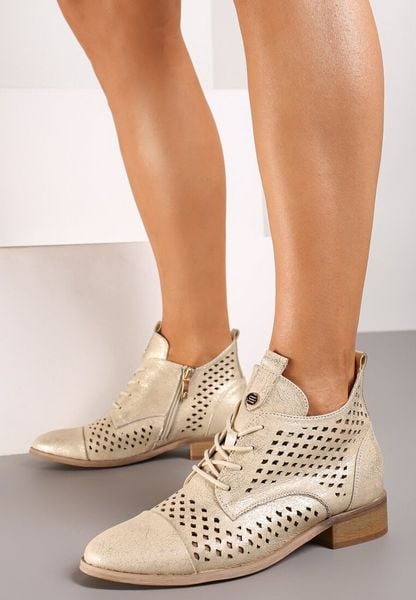 Złote Ażurowe Wiązane Botki na Płaskiej Podeszwie ze Skórzaną Wkładką Tagelia. Żółte botki damskie Born2be, z kaszmiru, eleganckie, bez obcasa, na płaskiej podeszwie, bez zapięcia. Za 179.99 zł.