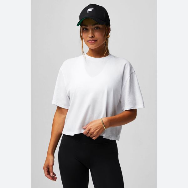 Koszulka damska Fabletics Boxy. Białe bluzki sportowe damskie FABLETICS, s, bez wzorów, z bawełny, bez ramiączek. Za 179.00 zł.