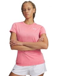 Under Armour Koszulka sportowa "Twist" w kolorze jasnoróżowym rozmiar: XS. Różowe bluzki sportowe damskie Under Armour, xs, bez wzorów, z materiału, bez ramiączek. Za 68.95 zł.