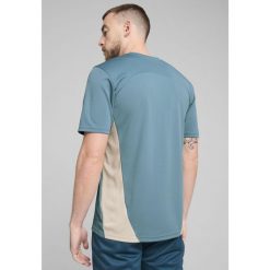 Męska koszulka treningowa Olympique Marsylia PUMA Bold Blue Putty Beige. Brązowe t-shirty sportowe męskie Puma, m, bez ramiączek, do piłki nożnej. Za 212.00 zł.