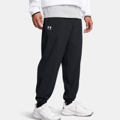 Spodnie męskie Under Armour Vibe Woven Jogger black/white. Czarne spodnie sportowe męskie Under Armour. Za 319.99 zł.