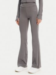 Guess Spodnie dresowe V5RB15 KCD02 Szary Regular Fit. Szare spodnie dresowe damskie Guess, s, z aplikacjami, z dresówki. Za 239.99 zł.