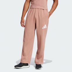 Spodnie Essentials Wide Leg 3 Bar Logo. Białe spodnie sportowe męskie Adidas, z materiału. Za 229.00 zł.