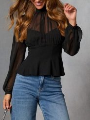 Milan Kiss Bluzka w kolorze czarnym rozmiar: M. Czarne bluzki damskie Milan Kiss, m, bez wzorów, bez kołnierzyka, bez ramiączek. Za 152.99 zł.