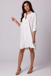 Luźna sukienka z kołnierzykiem guzikami i kieszeniami ecru. Sukienki damskie Bewear, do pracy, l, bez wzorów, z materiału, biznesowe, bez kołnierzyka, bez ramiączek, trapezowe. Za 339.00 zł.