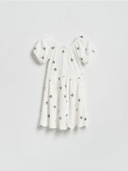 Wzorzysta sukienka - złamana biel. Sukienki dziewczęce Reserved, bez wzorów, z dzianiny, bez ramiączek. Za 69.99 zł.