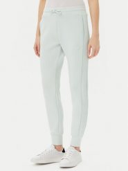 Guess Spodnie dresowe V2YB18 K7UW2 Zielony Regular Fit. Zielone spodnie dresowe damskie Guess, l, z aplikacjami, z dresówki. Za 229.99 zł.