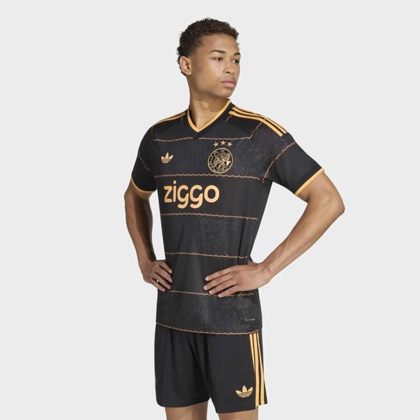 Koszulka piłkarska ADIDAS Ajax Amsterdam 26/27 wyjazdowa. Bluzki sportowe damskie Adidas, l, bez wzorów, z materiału, bez ramiączek. Za 439.99 zł.