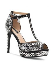 Nine West Sandały NISA SY015-1NW Czarny. Czarne sandały damskie Nine West, bez wzorów, z materiału, bez obcasa, na szpilce. Za 179.99 zł.