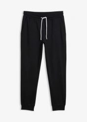 Spodnie dresowe, regular fit. Niebieskie spodnie dresowe męskie bonprix, bez wzorów, z dresówki. Za 84.99 zł.