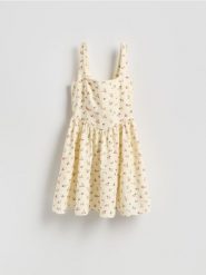 Wzorzysta sukienka mini - wielobarwny. Sukienki damskie Reserved, l, bez wzorów, z bawełny, bez kołnierzyka, bez ramiączek, mini, rozkloszowane. Za 239.99 zł.