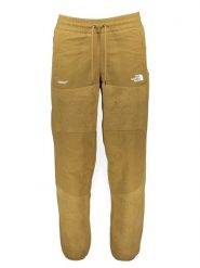 The North Face Spodnie polarowe "Soukuu" w kolorze żółtym rozmiar: M. Żółte spodnie materiałowe męskie The North Face, bez wzorów, z polaru. Za 388.16 zł.