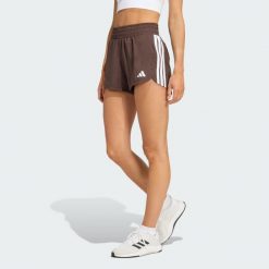 Szorty treningowe Pacer Workout Woven High Rise. Białe szorty damskie Adidas, bez wzorów, sportowe. Za 149.00 zł.