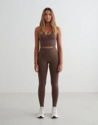 Damskie legginsy dłuższe, wysoki stan, invisible scrunch Shape Seamless brązowe. Brązowe legginsy damskie Aim'n, m, bez wzorów, z dzianiny. Za 301.00 zł.