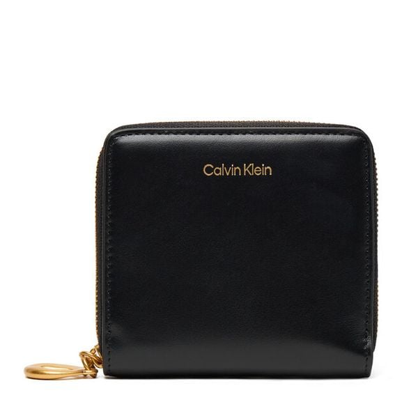 Portfel Calvin Klein. Czarne portfele damskie CALVIN KLEIN, bez wzorów. Za 149.99 zł.