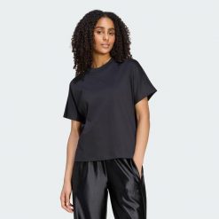 LUŹNA KOSZULKA SOFT LUX. Czarne t-shirty damskie Adidas, xl, bez wzorów, z bawełny, bez kołnierzyka. Za 199.00 zł.