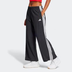 Second Life - Spodnie damskie ADIDAS - Stan Doskonały. Czarne spodnie materiałowe damskie Adidas, bez wzorów, z materiału, eleganckie. Za 164.99 zł.