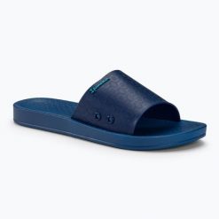 Klapki damskie Ipanema Anat Classic. Niebieskie klapki damskie Ipanema, bez wzorów, z materiału, bez obcasa. Za 89.99 zł.