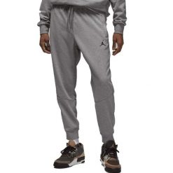 Spodnie Dri-FIT Sport Crossover Rozmiar M Szary - DQ7332-091. Szare spodnie sportowe męskie Nike, z dzianiny. Za 297.85 zł.