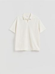 Koszulka polo oversize - złamana biel. Koszulki polo męskie Reserved, l, bez wzorów, z bawełny, bez ramiączek. Za 99.99 zł.