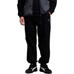 Spodnie męskie Puma tech Winterized Relaxed Pants. Czarne spodnie sportowe męskie Puma, z materiału. Za 243.99 zł.