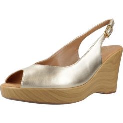 Sandały UNISA RACHEL LMT Złoty. Żółte sandały damskie Unisa, bez wzorów, ze skóry, bez obcasa. Za 390.99 zł.