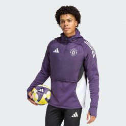 Koszulka Manchester United Tiro 25 Competition Winterized. Białe t-shirty sportowe męskie Adidas, xs, z dresówki, bez ramiączek, do piłki nożnej. Za 369.00 zł.