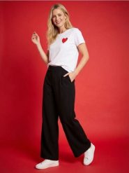 Spodnie wide leg z ozdobnym pasem - czarny. Czarne spodnie materiałowe damskie Sinsay, bez wzorów. Za 59.99 zł.