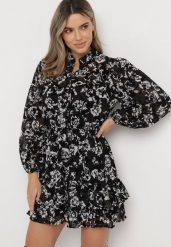 Czarna Rozkloszowana Sukienka Mini w Kwiaty z Falbanką Matera. Czarne sukienki damskie Born2be, l, z aplikacjami, bez kołnierzyka, bez ramiączek, mini, rozkloszowane. W wyprzedaży za 143.99 zł.