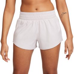 Spodenki Nike One, Kobiety. Fioletowe szorty damskie Nike, bez wzorów, z poliesteru. Za 190.25 zł.