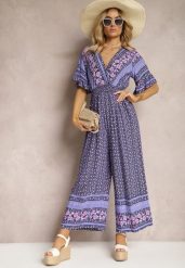 Granatowy Kopertowy Kombinezon Bawełniany z Cienkimi Gumeczkami w Pasie Zapinany na Szyi Orithiama. Niebieskie kombinezony damskie Renee, na lato, m, bez wzorów, z bawełny, eleganckie, bez kołnierzyka, bez ramiączek, krótkie. Za 39.99 zł.