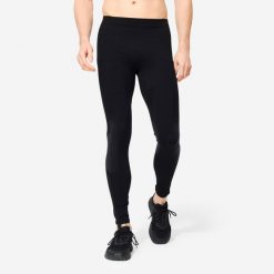 Legginsy fitness męskie Domyos cross training. Czarne spodnie sportowe męskie DOMYOS, z elastanu. Za 59.99 zł.