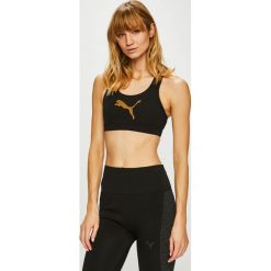 Puma - Biustonosz sportowy. Czarne biustonosze Puma, bez wzorów, z elastanu. Za 139.90 zł.
