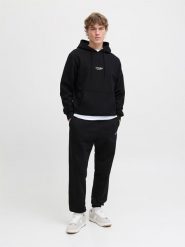 Jack & Jones Spodnie dresowe "Jpdtkane" w kolorze czarnym rozmiar: L. Czarne spodnie dresowe męskie Jack & Jones, bez wzorów, z bawełny. Za 109.95 zł.